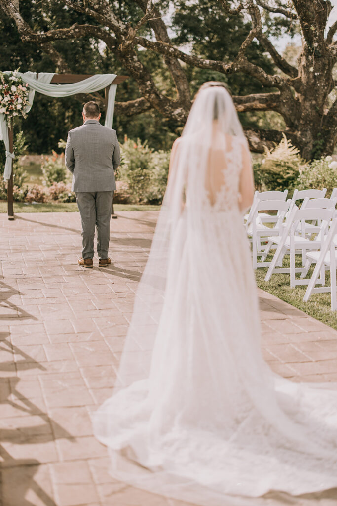 bride and groom Alabama wedding first look