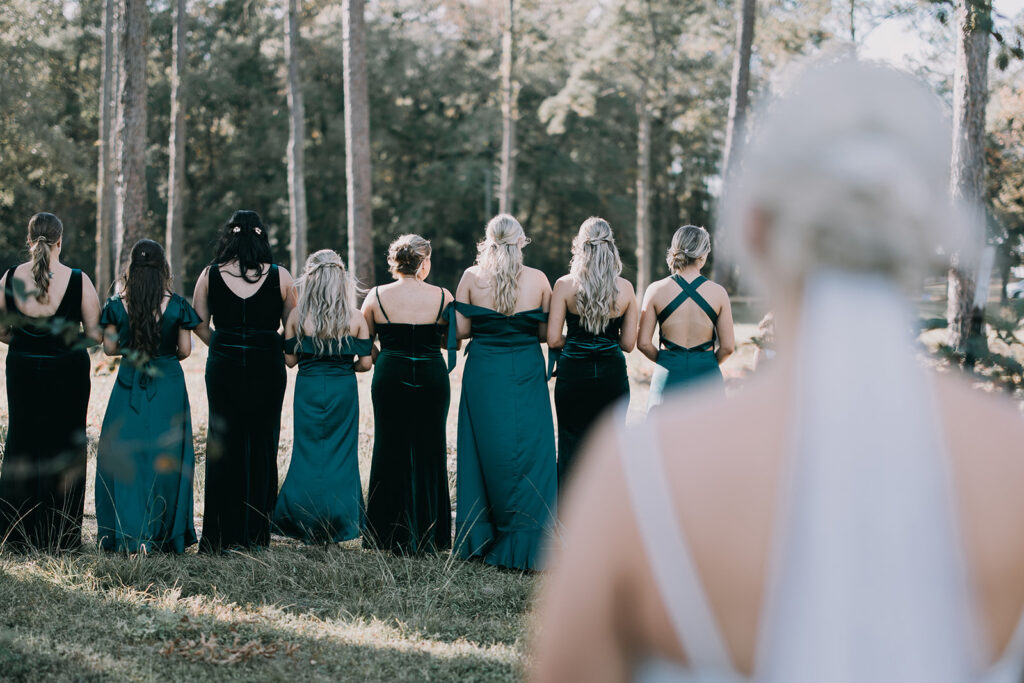 bride and bridesmaids first look