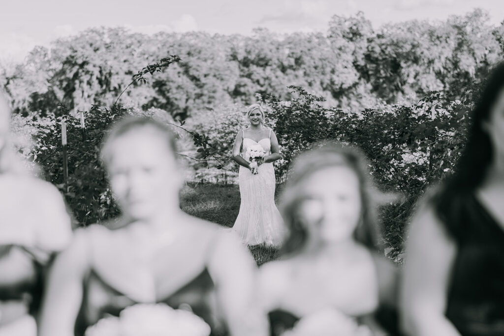 bride and bridesmaids first look