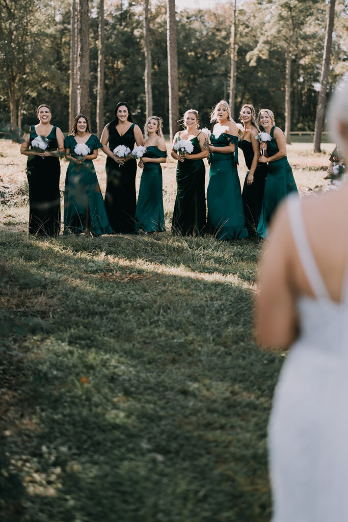 bride and bridesmaids first look