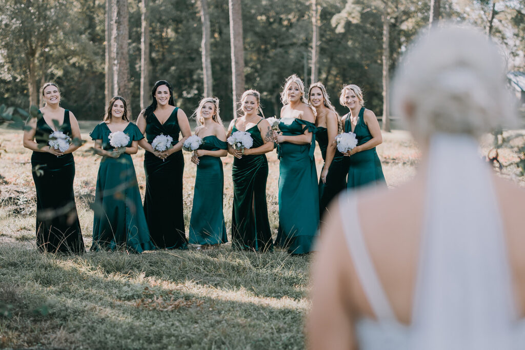 bride and bridesmaids first look