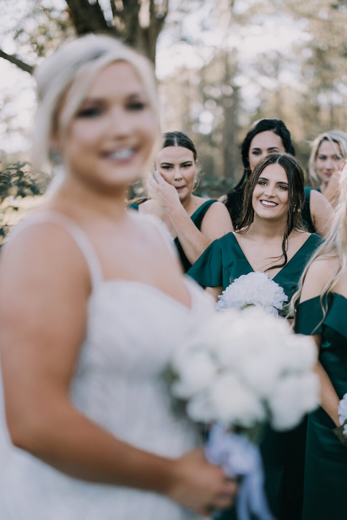 bride and bridesmaids first look