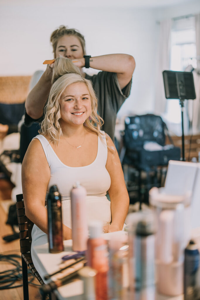 bride getting her hair and make up done