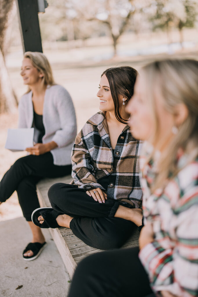 bridesmaids secretly rehearsing their speeches outside while bride is getting ready