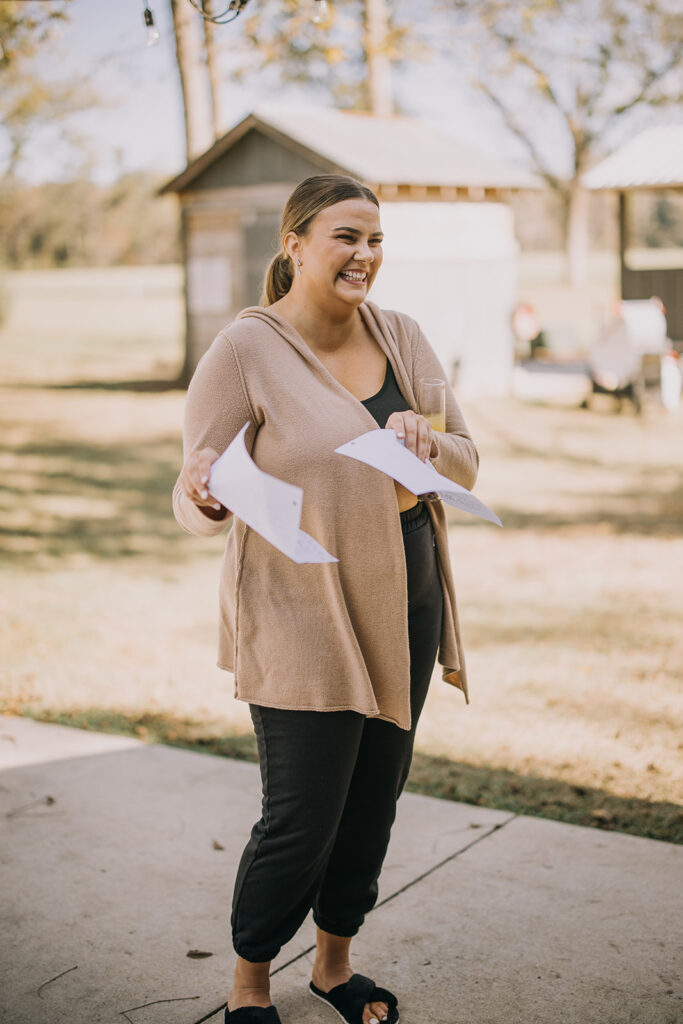 bridesmaids secretly rehearsing their speeches outside while bride is getting ready