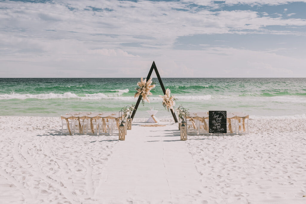 boho wedding ceremony set up at the beach in Florida