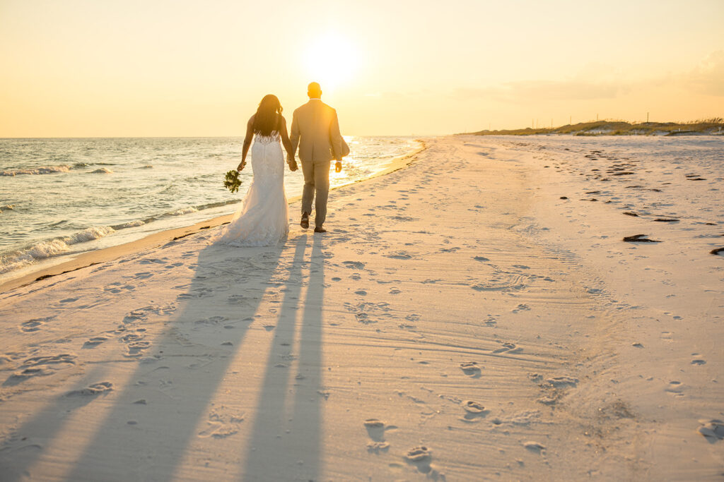 golden hour bride and groom portrait at the beach