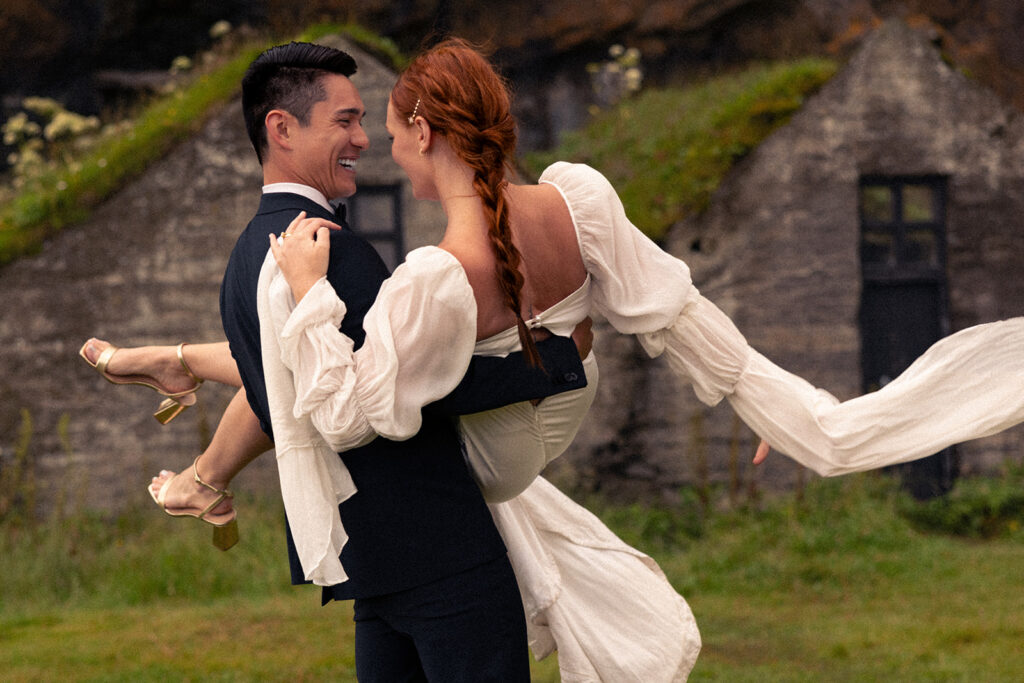 playful bride and groom during their Iceland vow renewal