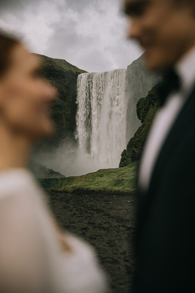 dreamy bride and groom during their Iceland Vow Renewal at Skogafoss Waterfall