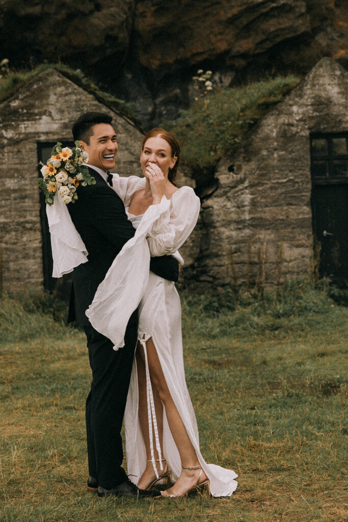 dreamy bride and groom during their Iceland Vow Renewal at Skogafoss Waterfall