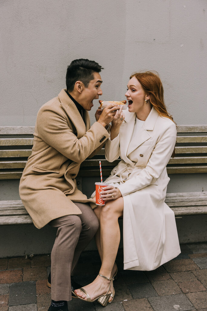 elopement couple enjoying a snack together in Reyjkavik