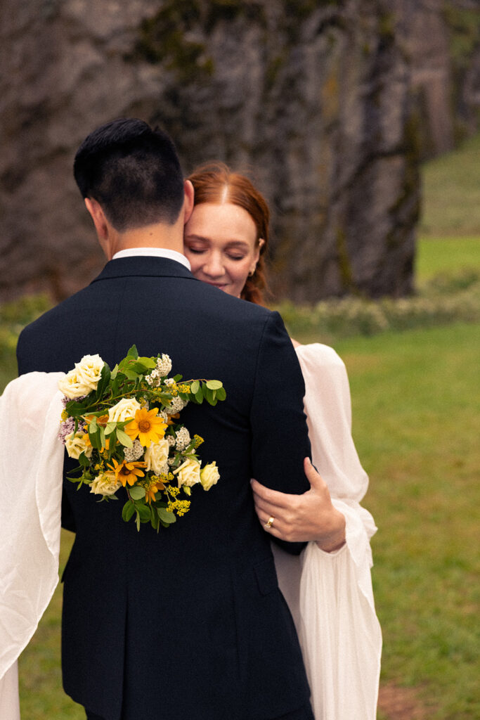 dreamy bride and groom during their Iceland Vow Renewal at Skogafoss Waterfall