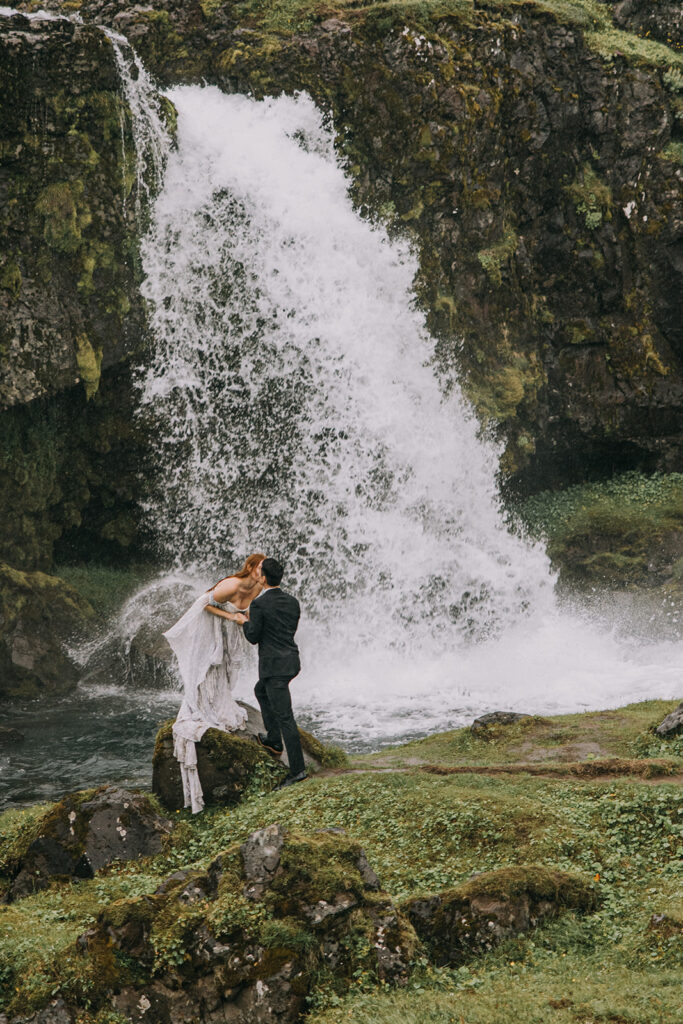 dreamy bride and groom during their Iceland Vow Renewal at Skogafoss Waterfall