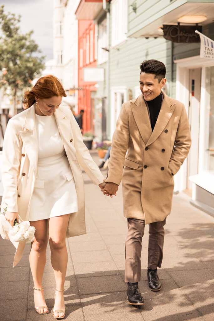 elopement couple exploring the colorful streets of downtown Reykjavik in Iceland