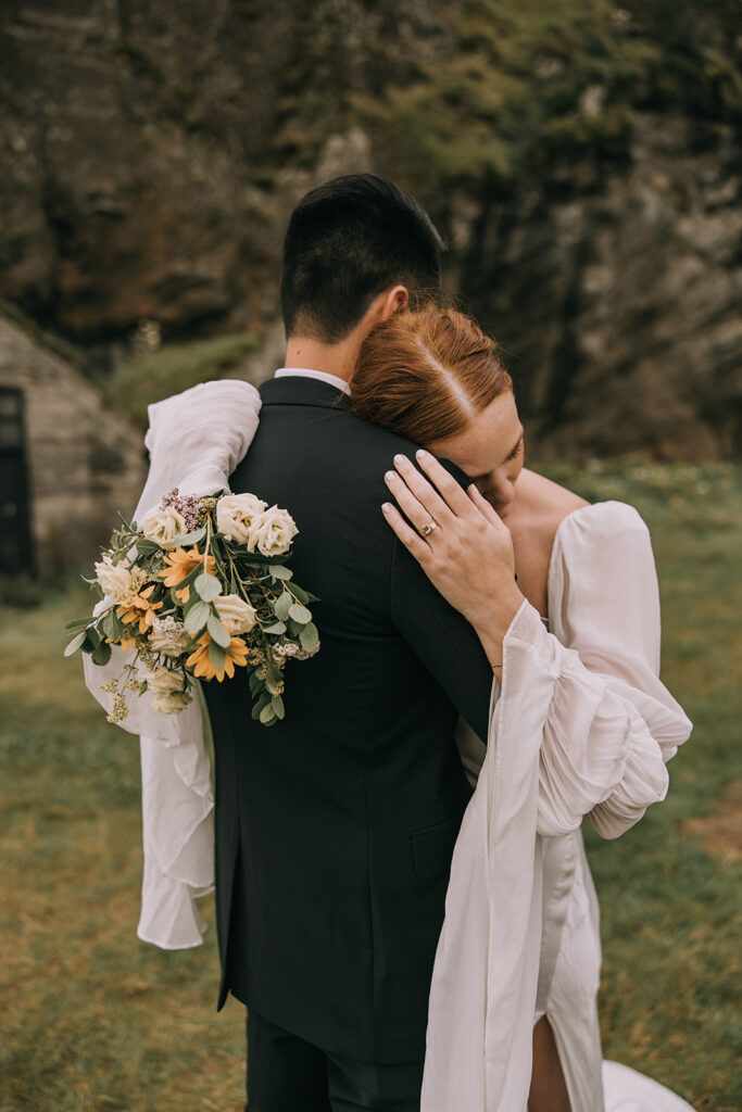 dreamy bride and groom during their Iceland Vow Renewal at Skogafoss Waterfall