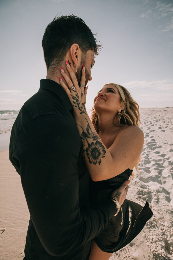 alternative couple in all black attire during their Pensacola beach wedding