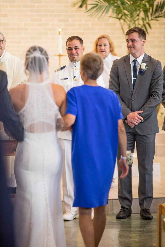 emotional groom reaction to bride walking down the aisle