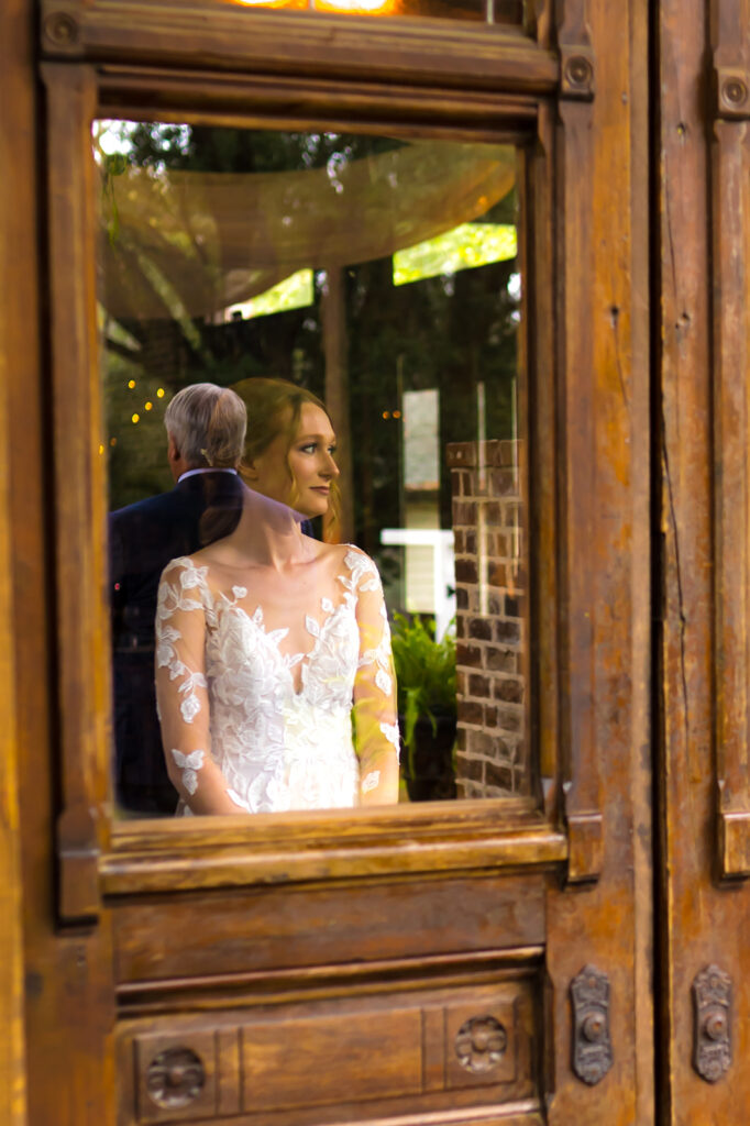 bride and dad first look as captured by the main photographer and second shooter