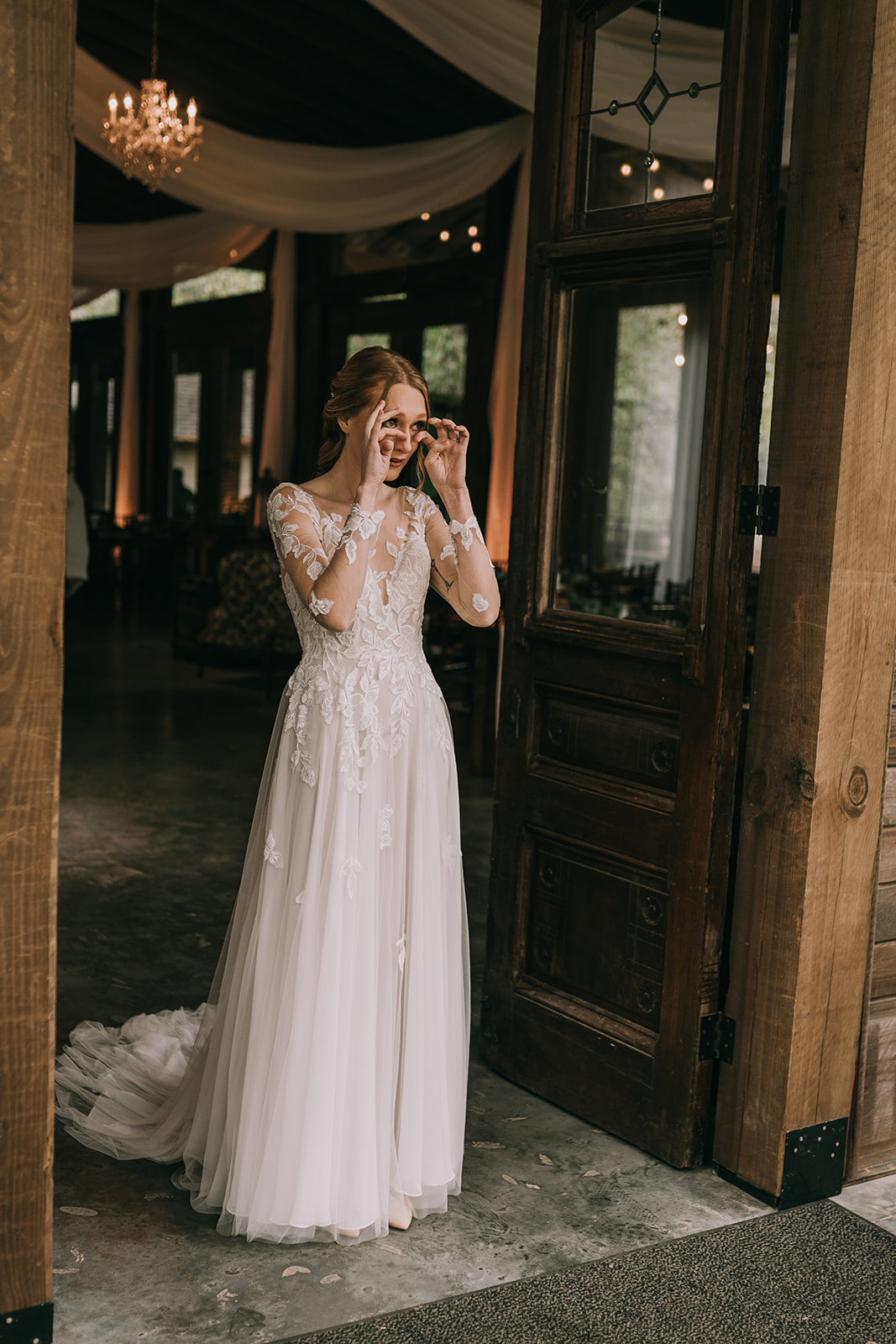 Bride reacts to seeing her father before her wedding ceremony.