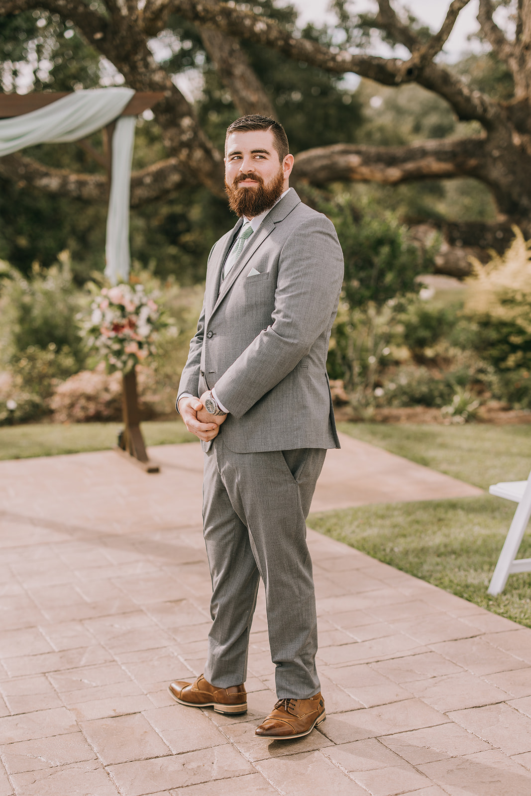 Groom turns to see his bride for the first time before their wedding in Southern Alabama. 