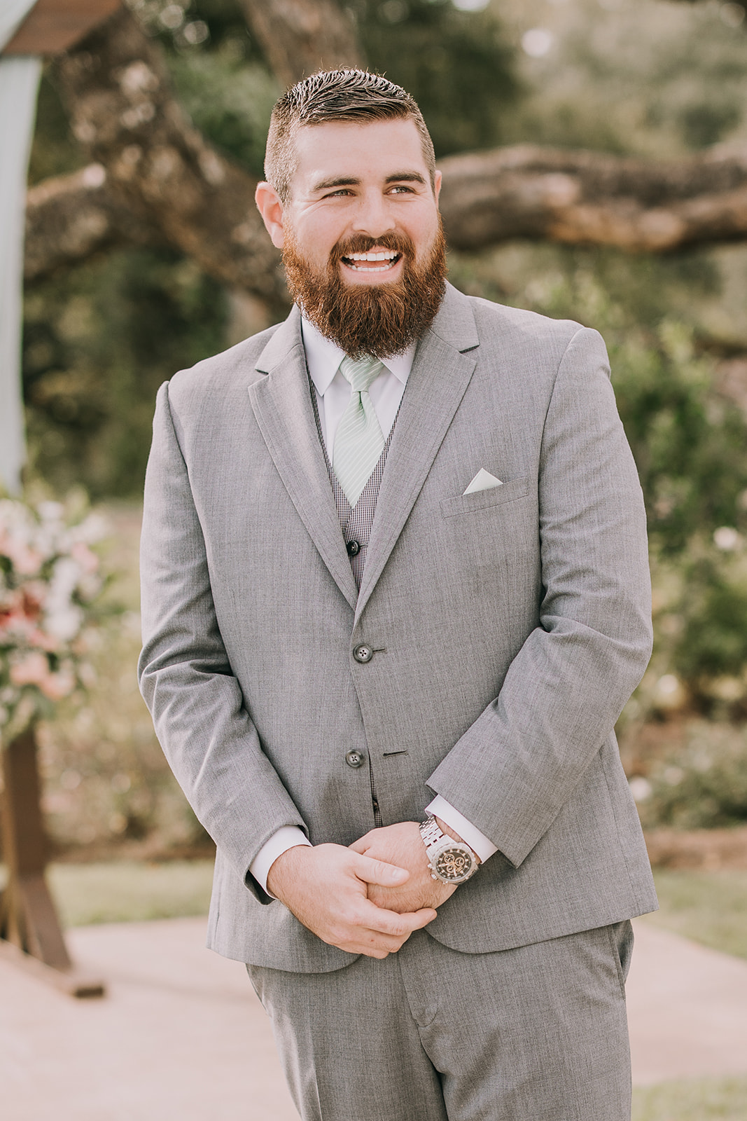 Groom smiles as he sees his bride for the first time before their wedding in Southern Alabama. 